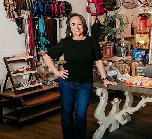 Adriana, owner of Wags & Wiggles Pet Boutique, in the Canton boutique