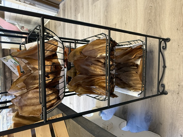 Assorted dehydrated dog treats in baskets